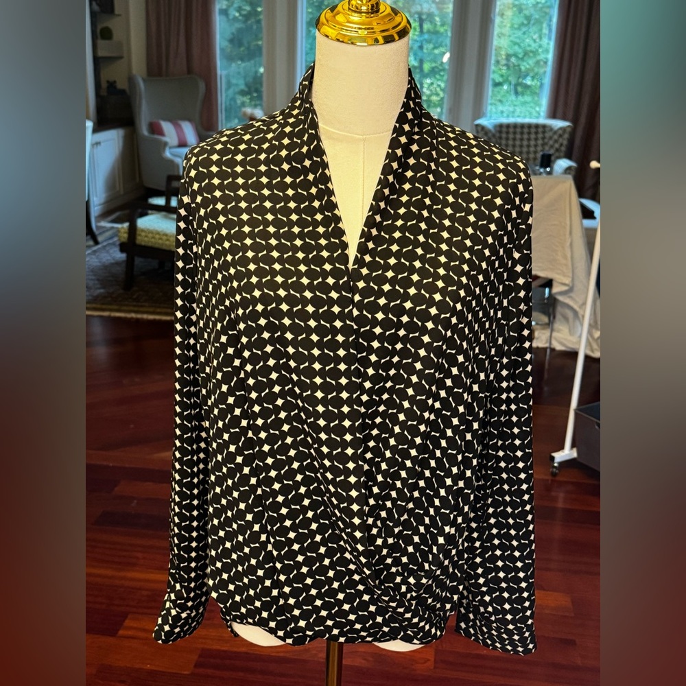 Black and cream patterned blouse